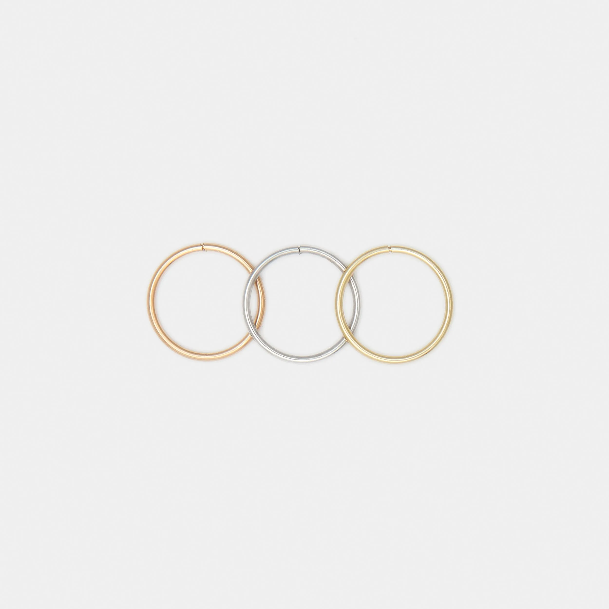 Tiny Hoops in 10k Gold