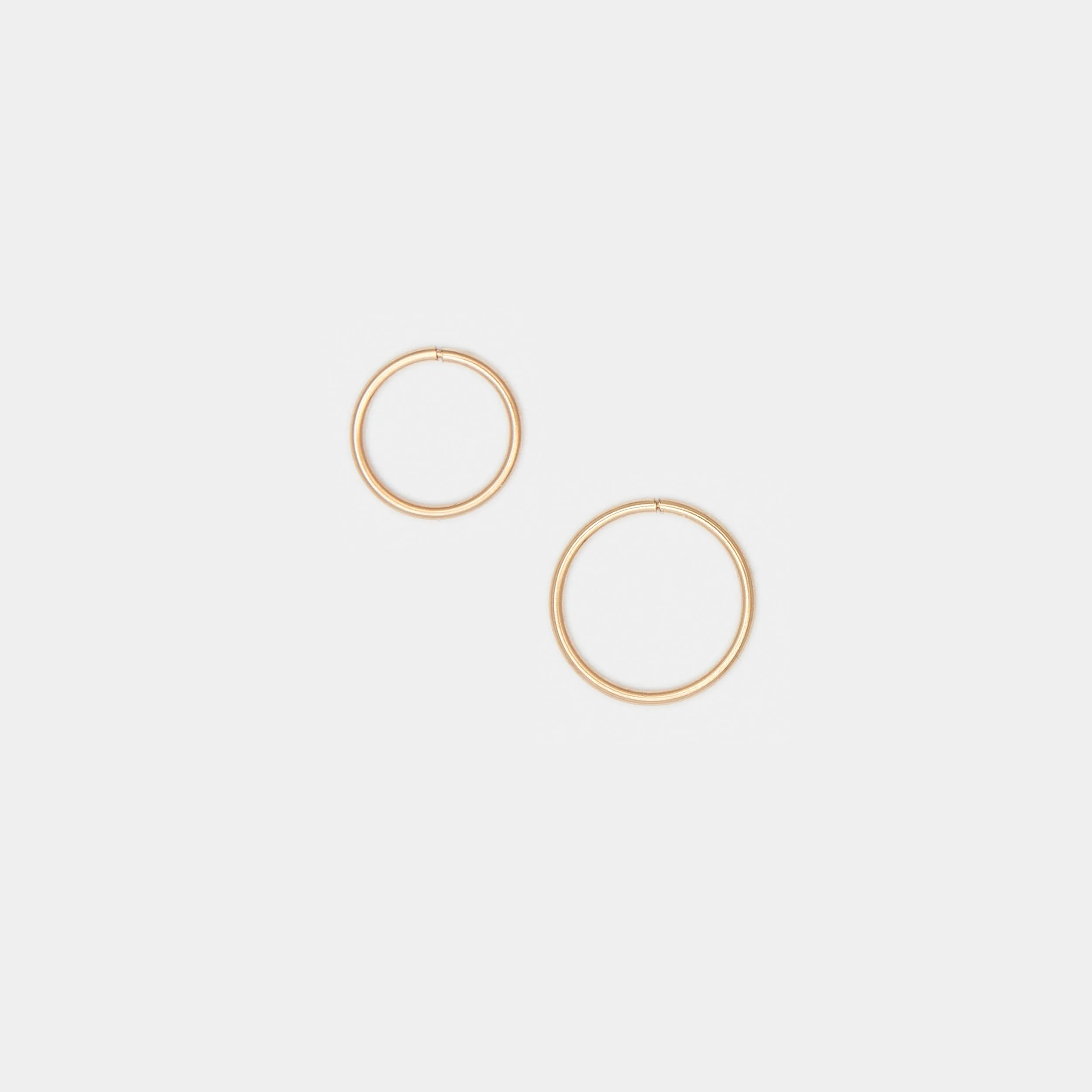 Tiny Hoops in 10k Gold